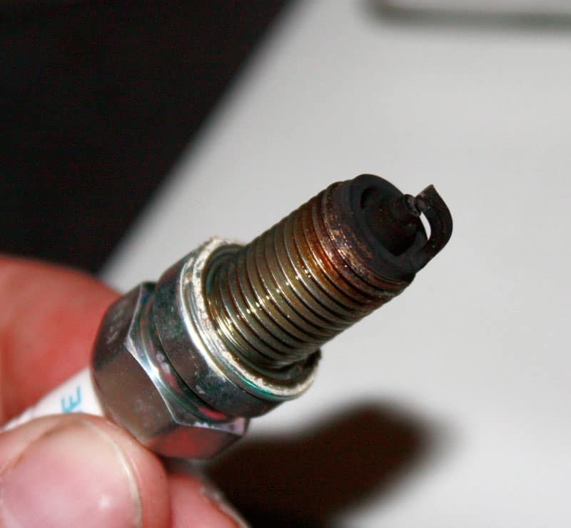 spark plug with black corrosion